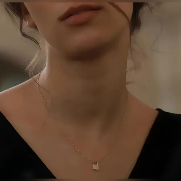 Anthropologie Jewelry - 18kt Gold Lock necklace